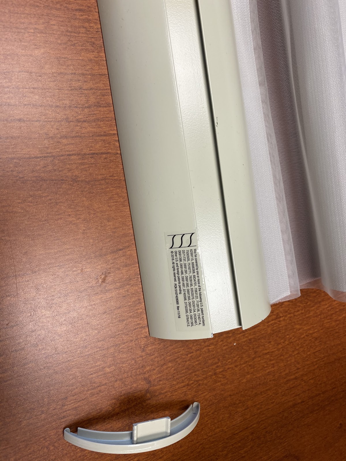 Remove one of the bottom rail end caps; the side does not matter..jpg