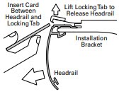 While holding the headrail, lift up to release the locking tab on the mounting brackets and remove the shading from the brackets. A.jpg