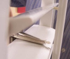 Grasp the exposed end and pull it straight out of the tilt bar.jpg